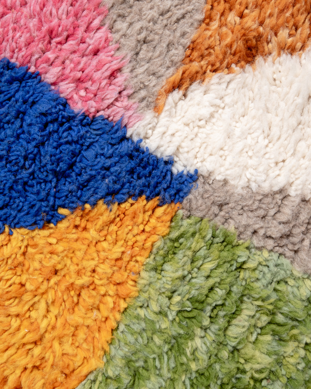 Modern, designer, handcrafted Berber rug from Morocco. Beniourain carpet with beautiful colours and patterns and fluffy wool texture.